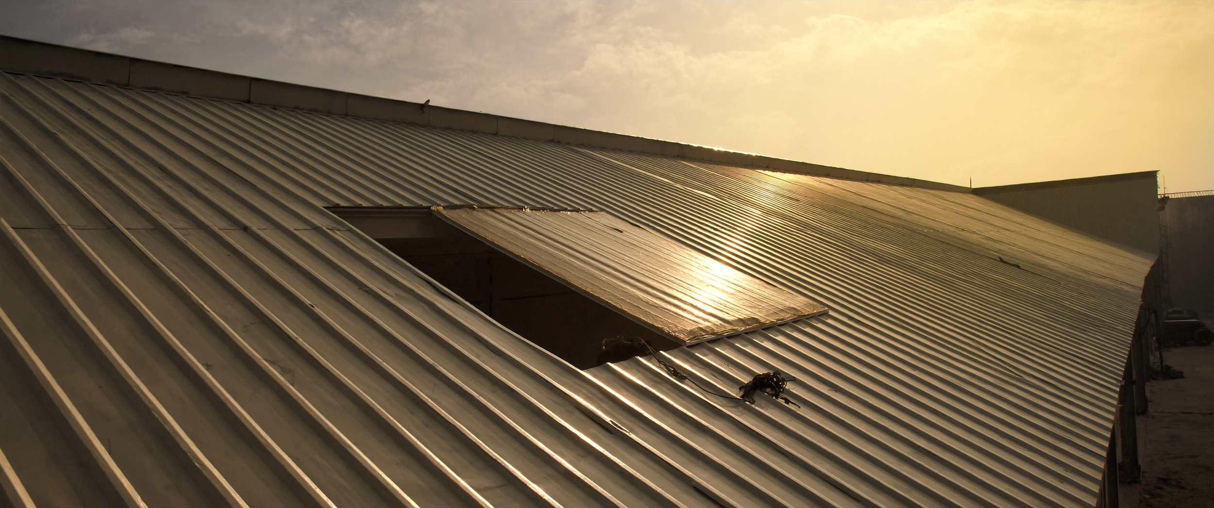 Retrofitting Skylights: How to Add Polycarbonate Rooflights to an Existing Metal Roof